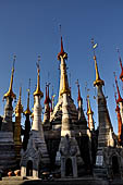 Inle Lake Myanmar. Indein, on the summit of a hill the  Shwe Inn Thein Paya a cluster of hundreds of ancient stupas. Many of them are ruined and overgrown with bushes.